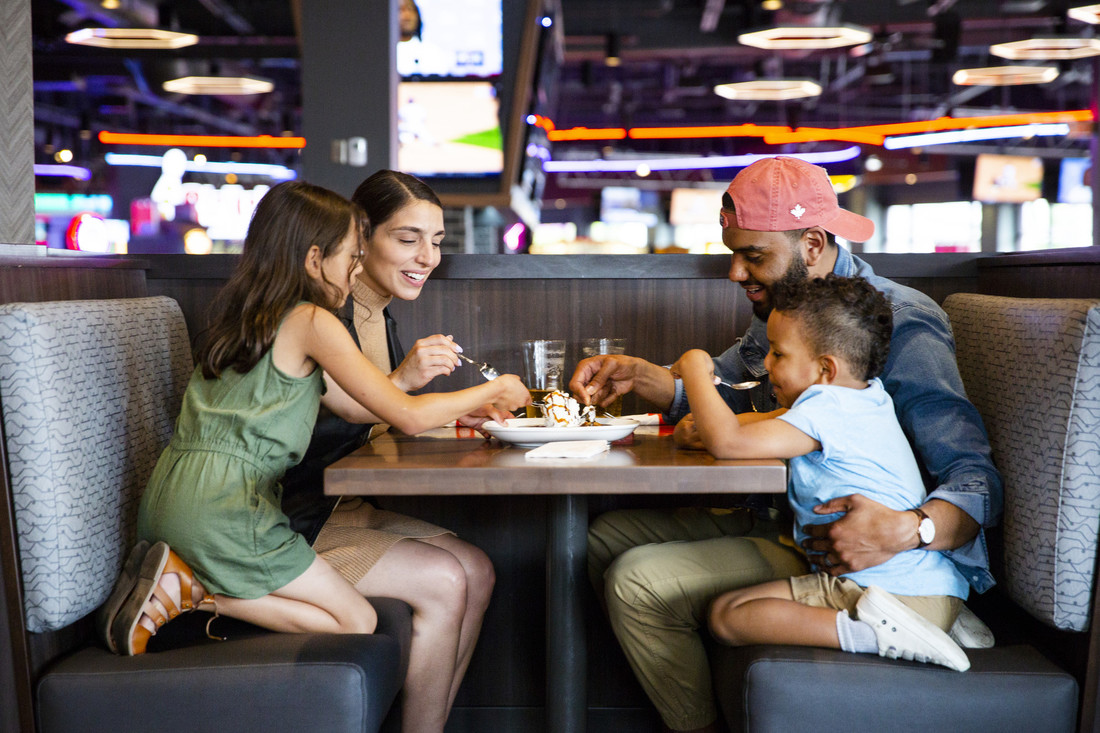 Boston Pizza family eating dinner
