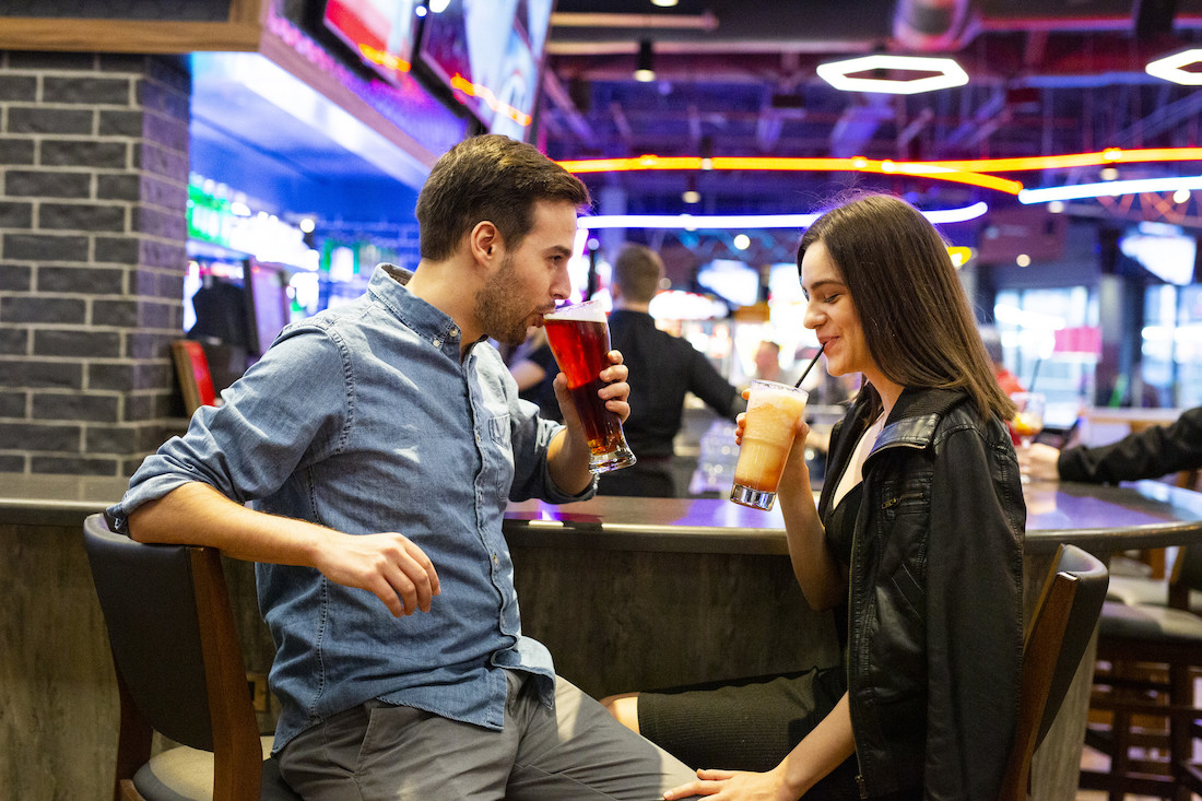 Boston Pizza couple sports bar area
